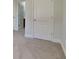 Clean and freshly painted hallway leading to the bathroom and additional rooms at 2413 Brynlynn Woods, Conyers, GA 30013