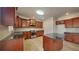 Gourmet kitchen featuring stainless steel appliances, granite countertops, and a center island at 2413 Brynlynn Woods, Conyers, GA 30013