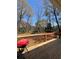 The outdoor deck overlooks the spacious backyard and landscaping at 2784 Williamsburg Way, Decatur, GA 30034