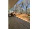 View of the back deck and well-manicured yard at 2784 Williamsburg Way, Decatur, GA 30034