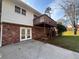 This home includes a walk out basement, a deck with stairs, and a cozy, enclosed backyard at 2784 Williamsburg Way, Decatur, GA 30034