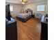 Nicely lit bedroom featuring hardwood floors, a window, and nice decor at 2784 Williamsburg Way, Decatur, GA 30034