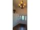 View of the front entryway and hanging chandelier at 2784 Williamsburg Way, Decatur, GA 30034