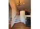Inviting foyer featuring hardwood floors, staircase, and chandelier at 2784 Williamsburg Way, Decatur, GA 30034