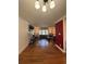 Open-concept living room featuring beautiful hardwood floors and ample natural light at 2784 Williamsburg Way, Decatur, GA 30034