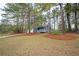 Charming two-story house with a well-maintained lawn and blue front door at 3201 Palomino Dr, Powder Springs, GA 30127