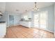 Eat-in kitchen featuring white appliances and bright tile flooring at 3201 Palomino Dr, Powder Springs, GA 30127
