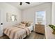 Cozy bedroom with neutral tones, stylish furniture, and a ceiling fan provides a relaxing space at 235 Briscoe Way # 7, Alpharetta, GA 30009