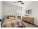 Cozy bedroom with neutral tones, stylish furniture, and a ceiling fan provides a relaxing space at 235 Briscoe Way # 7, Alpharetta, GA 30009