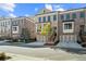 Modern brick townhomes with two car garages, second story balconies, and well-maintained landscaping at 235 Briscoe Way # 7, Alpharetta, GA 30009