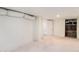 Unfinished basement offering ample space, white walls, visible ductwork, and a storage area at 2949 Pearl St, East Point, GA 30344