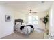 Serene bedroom with neutral colors, plush carpeting, and plenty of natural light at 2949 Pearl St, East Point, GA 30344