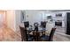 Cozy dining area open to the kitchen, featuring a round table and modern décor at 2949 Pearl St, East Point, GA 30344