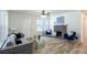 Bright living room with a decorative brick fireplace and modern decor at 2949 Pearl St, East Point, GA 30344