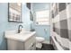 Bathroom features a sleek vanity, ample lighting, and modern fixtures, providing a refreshing space at 4900 College St, Union City, GA 30291