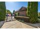 Community Entrance with a gated entrance with well-maintained landscaping and clear signage at 5860 Bluff Heights Drive, Cumming, GA 30040