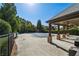 Community pool with a covered pavilion and ample seating, perfect for relaxation and entertainment at 5860 Bluff Heights Drive, Cumming, GA 30040