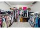 Walk-in closet features built-in shelves and ample storage space at 5860 Bluff Heights Drive, Cumming, GA 30040