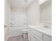 Bathroom featuring tub/shower combo and solid-surface vanity at 1011 Stillington Way, Kennesaw, GA 30152