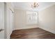 Bedroom with hardwood floors, natural light, and closet at 1011 Stillington Way, Kennesaw, GA 30152