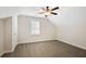 Bedroom featuring neutral carpet, ceiling fan, and window with blinds at 1011 Stillington Way, Kennesaw, GA 30152
