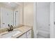 Bathroom with granite countertops, tub with gold fixtures and a glass doored shower at 1811 Lake Cove Sw Dr, Atlanta, GA 30331