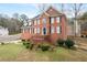 Beautiful traditional brick home with a manicured lawn and inviting front entrance at 1811 Lake Cove Sw Dr, Atlanta, GA 30331