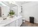 Bright bathroom with double vanity, ample counter space, and modern fixtures at 2770 Da Vinci Cres, Decatur, GA 30034