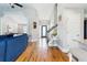 Inviting entryway features hardwood floors, a modern chandelier, and views into the living room at 2770 Da Vinci Cres, Decatur, GA 30034