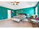 Light-filled main bedroom features a stylish interior, modern tray ceiling, and cozy accents at 2770 Da Vinci Cres, Decatur, GA 30034