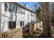 Back of house featuring an enclosed yard with a wood fence and a partial view of the backyard at 303 Brandywine Cir, Atlanta, GA 30350
