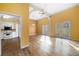 Spacious living room features hardwood floors, and access to kitchen and patio through sliding glass doors at 303 Brandywine Cir, Atlanta, GA 30350