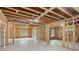 Unfinished basement with exposed framing, ready to be finished your way at 346 Langford Dr, Norcross, GA 30071