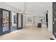 Open dining area showcasing hardwood floors, patio access, and seamlessly flowing into the kitchen at 346 Langford Dr, Norcross, GA 30071