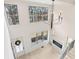 Open foyer featuring many large windows and a hanging black chandelier at 346 Langford Dr, Norcross, GA 30071