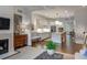 Open concept with fireplace, kitchen, and dining area at 45 Honour Nw Ave, Atlanta, GA 30305