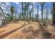 Image shows the size of the backyard, which features mature trees, landscaping, and privacy at 1937 Joseph Ct, Decatur, GA 30032