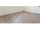 Finished basement area with wood-look flooring, offering a versatile living space at 1937 Joseph Ct, Decatur, GA 30032