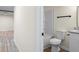 Bright bathroom featuring a combined bathtub and shower, plus a white toilet and vanity at 1937 Joseph Ct, Decatur, GA 30032
