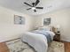Comfortable bedroom features a ceiling fan, hardwood floors, and bright, airy feel at 1937 Joseph Ct, Decatur, GA 30032