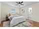 Bright bedroom with a ceiling fan and large windows at 1937 Joseph Ct, Decatur, GA 30032