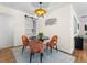 Cozy dining room featuring a stylish table, chairs, unique light fixture, and modern decor at 1937 Joseph Ct, Decatur, GA 30032
