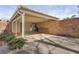 Brick carport providing convenient covered parking and additional storage at 3346 Stonecrest Ct, Atlanta, GA 30341