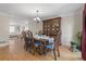 Spacious dining room featuring a wooden table, and hardwood floors at 3346 Stonecrest Ct, Atlanta, GA 30341