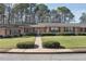 Traditional brick home with a manicured lawn and mature trees, providing a serene setting at 3346 Stonecrest Ct, Atlanta, GA 30341
