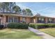 Charming single-story brick home featuring well-maintained landscaping and a welcoming entrance at 3346 Stonecrest Ct, Atlanta, GA 30341