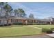Lovely ranch-style home featuring a lush lawn and mature trees for shade and privacy in a desirable neighborhood at 3346 Stonecrest Ct, Atlanta, GA 30341