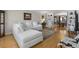 Cozy living room with hardwood floors and a comfortable white sectional sofa at 3346 Stonecrest Ct, Atlanta, GA 30341