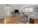 Bright living room featuring hardwood floors, neutral walls, and an abundance of natural light at 3346 Stonecrest Ct, Atlanta, GA 30341