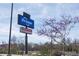 View of a Kroger sign with nearby stores in the shopping center at 3346 Stonecrest Ct, Atlanta, GA 30341